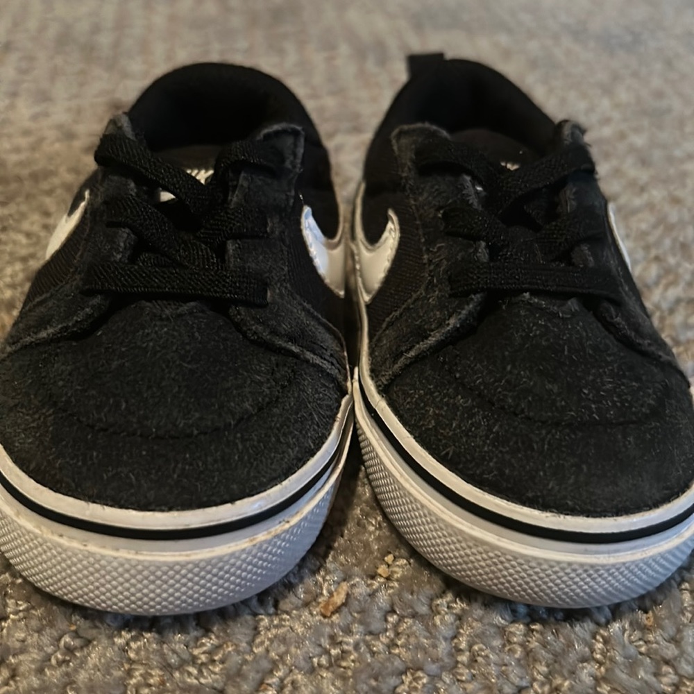 Black Nikes size 3